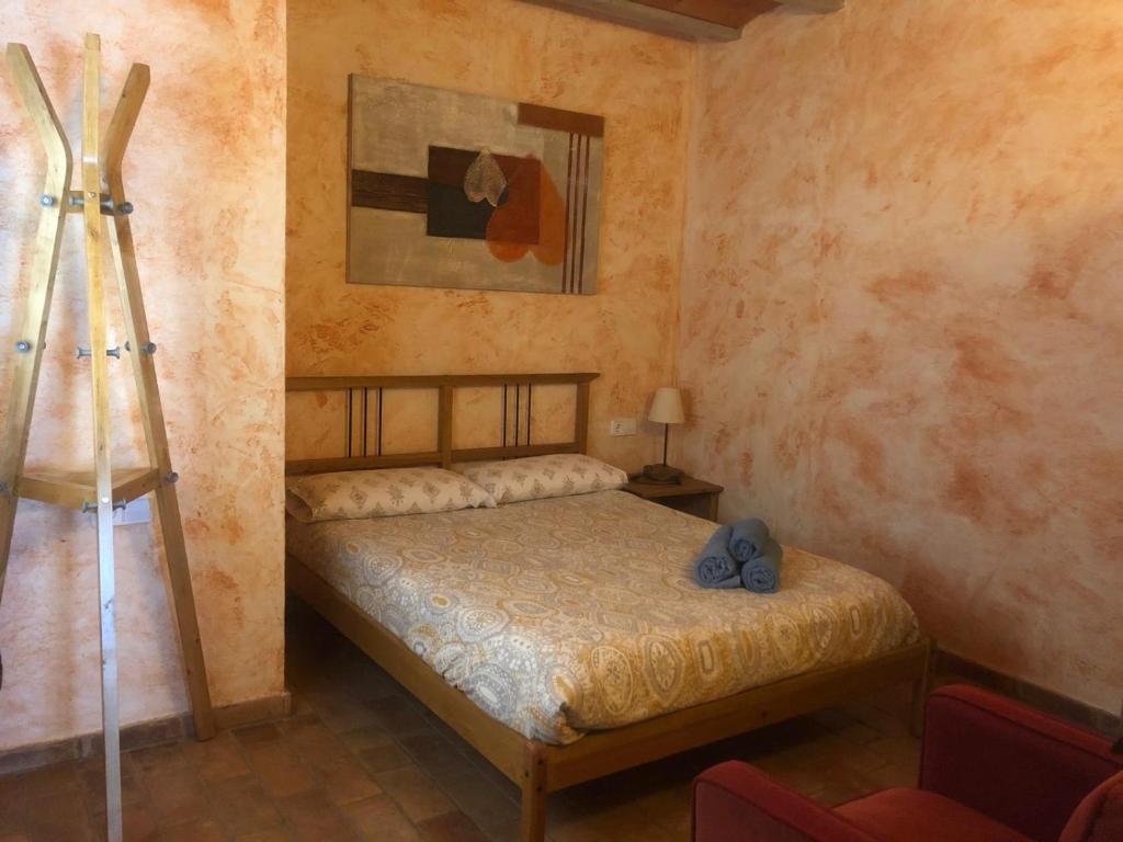 Postel nebo postele na pokoji v ubytování Apartaments Alzina