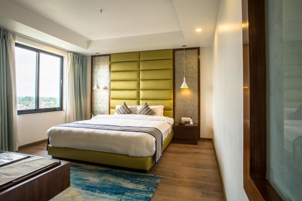 Postel nebo postele na pokoji v ubytování Hotel Siddhartha, Nepalgunj