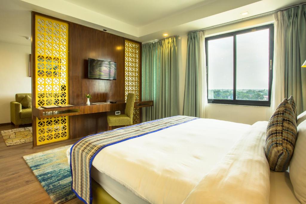 Postel nebo postele na pokoji v ubytování Hotel Siddhartha, Nepalgunj