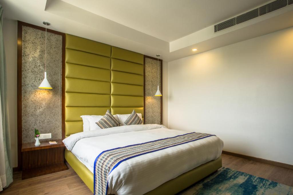 Postel nebo postele na pokoji v ubytování Hotel Siddhartha, Nepalgunj