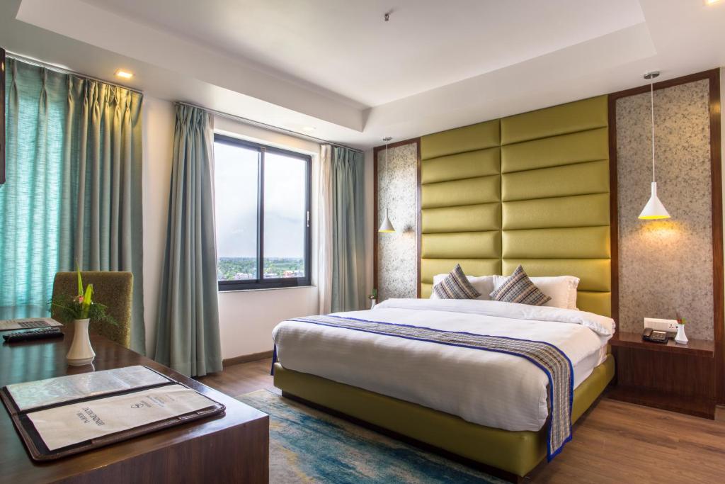 Postel nebo postele na pokoji v ubytování Hotel Siddhartha, Nepalgunj