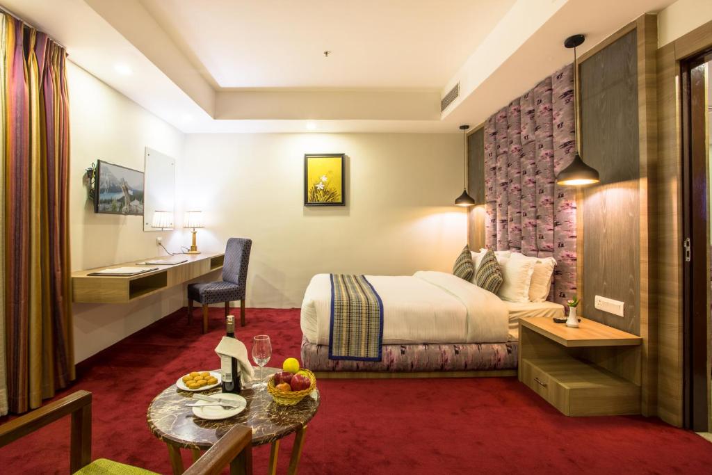 Postel nebo postele na pokoji v ubytování Hotel Siddhartha, Nepalgunj