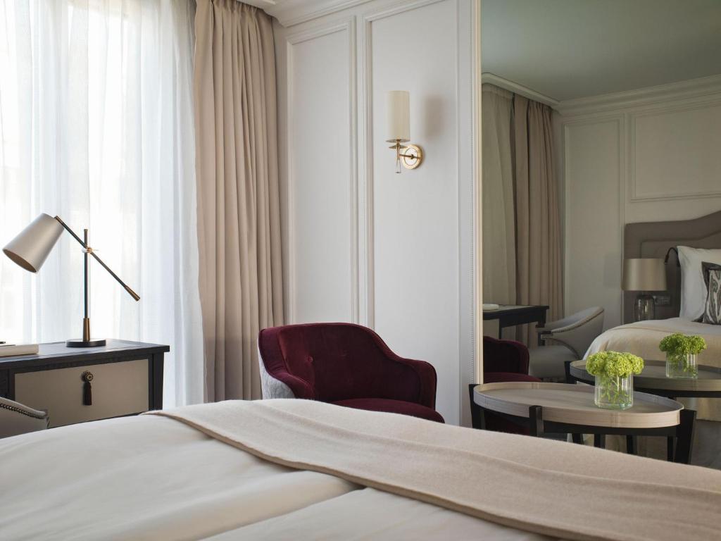 Postel nebo postele na pokoji v ubytování Britannia Hotel