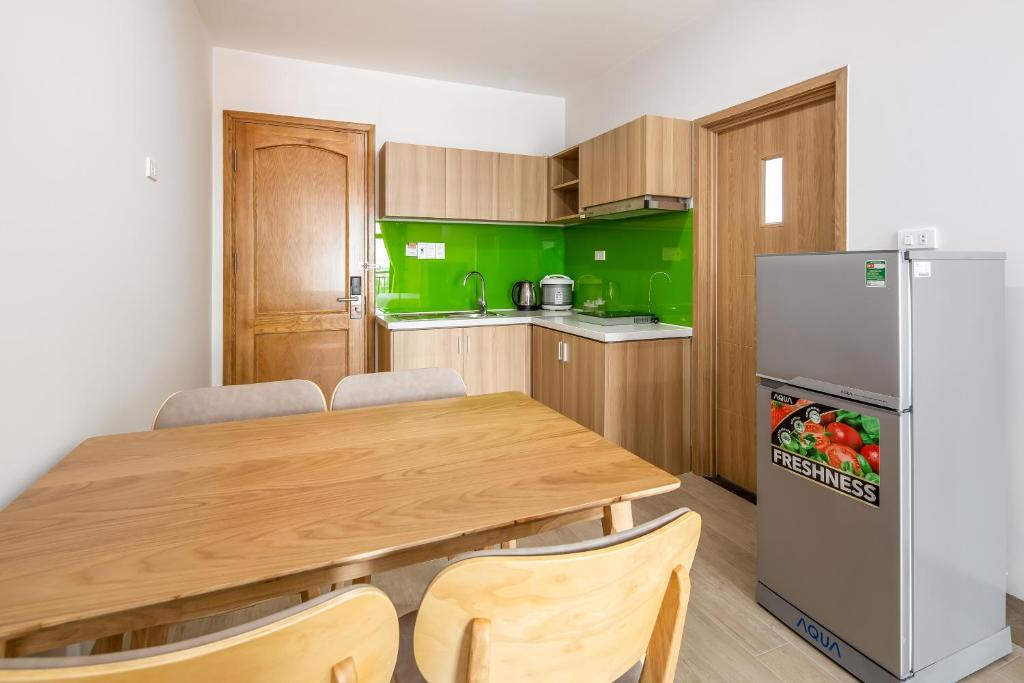 Kuchyň nebo kuchyňský kout v ubytování An Dương Hotel & Apartment