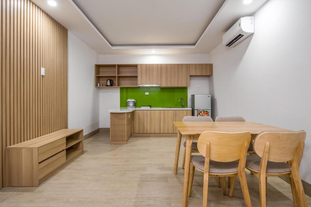 Kuchyň nebo kuchyňský kout v ubytování An Dương Hotel & Apartment