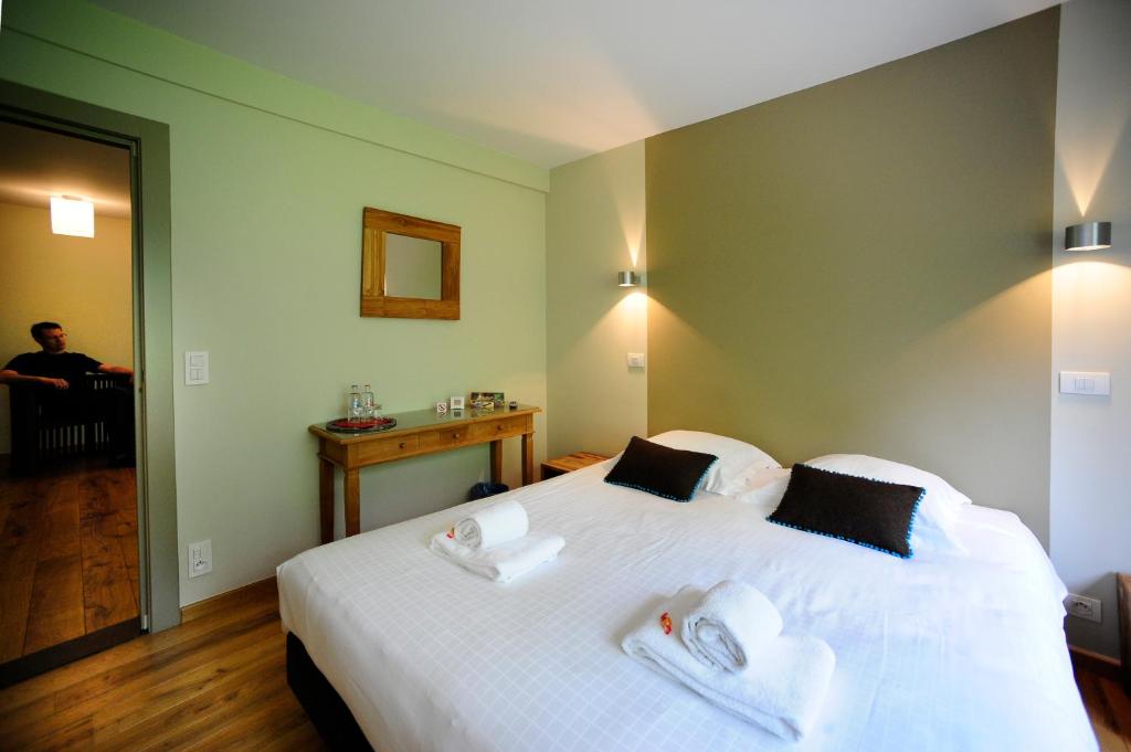 Postel nebo postele na pokoji v ubytování B&B De Meren