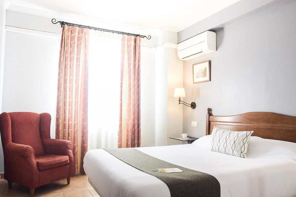 Postel nebo postele na pokoji v ubytování Villa Soledad