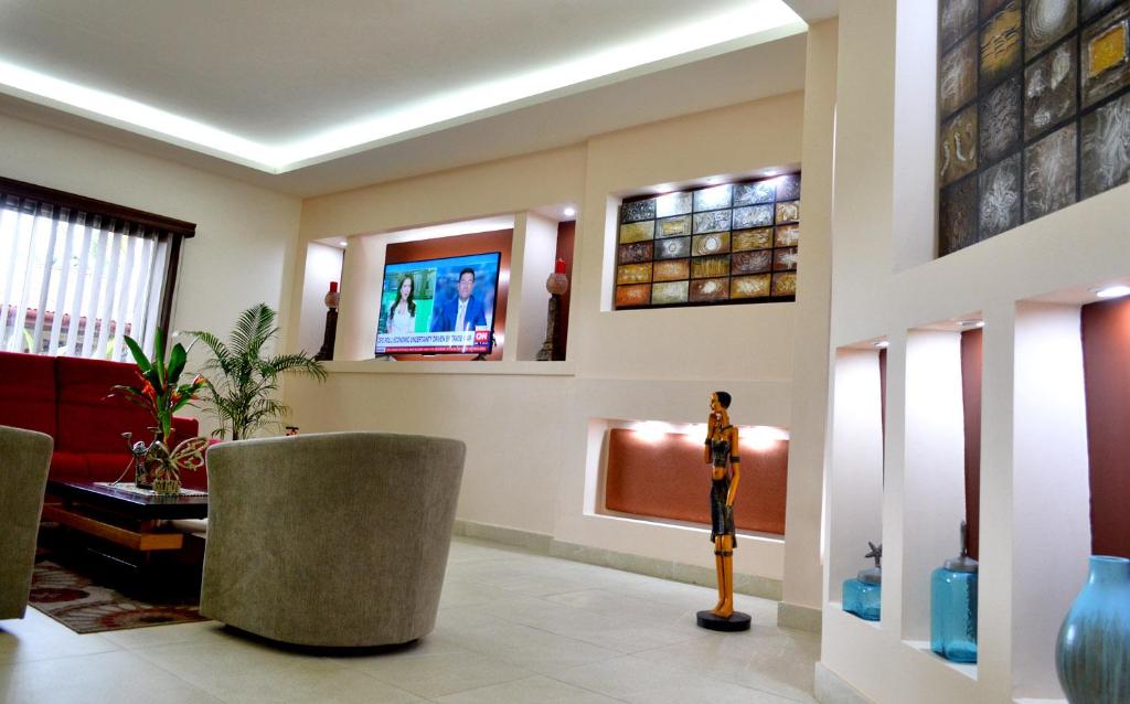 TV a/nebo společenská místnost v ubytování The Cape Hotel
