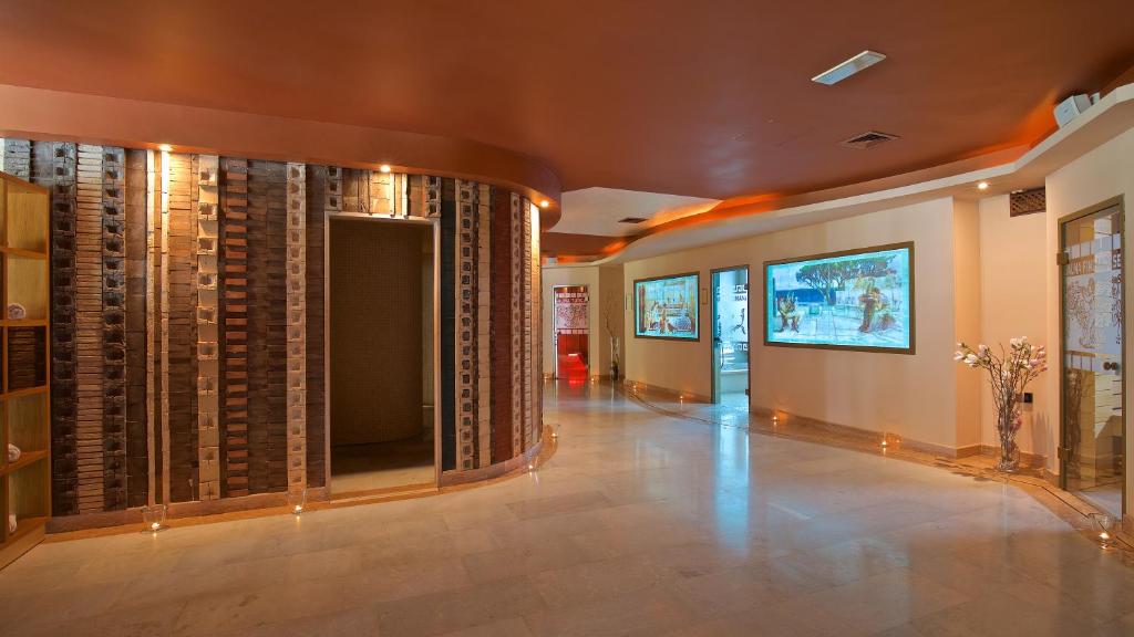 TV a/nebo společenská místnost v ubytování Mulino Luxury Boutique Hotel
