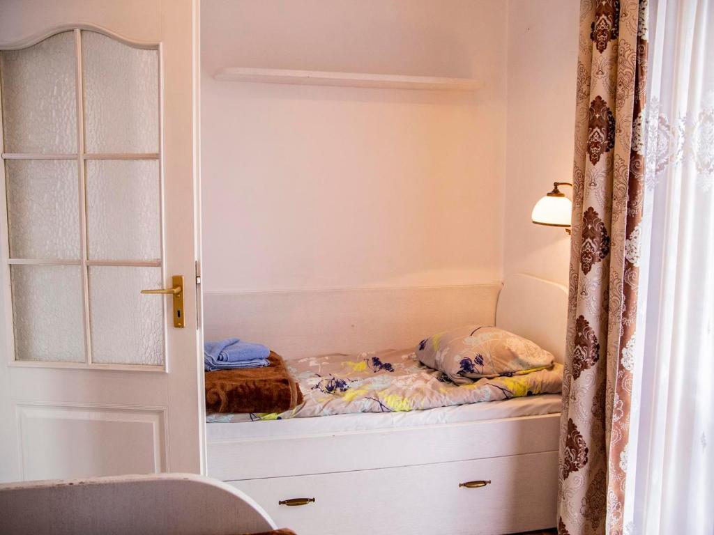 Postel nebo postele na pokoji v ubytování Ośrodek Wypoczynkowy Baśka