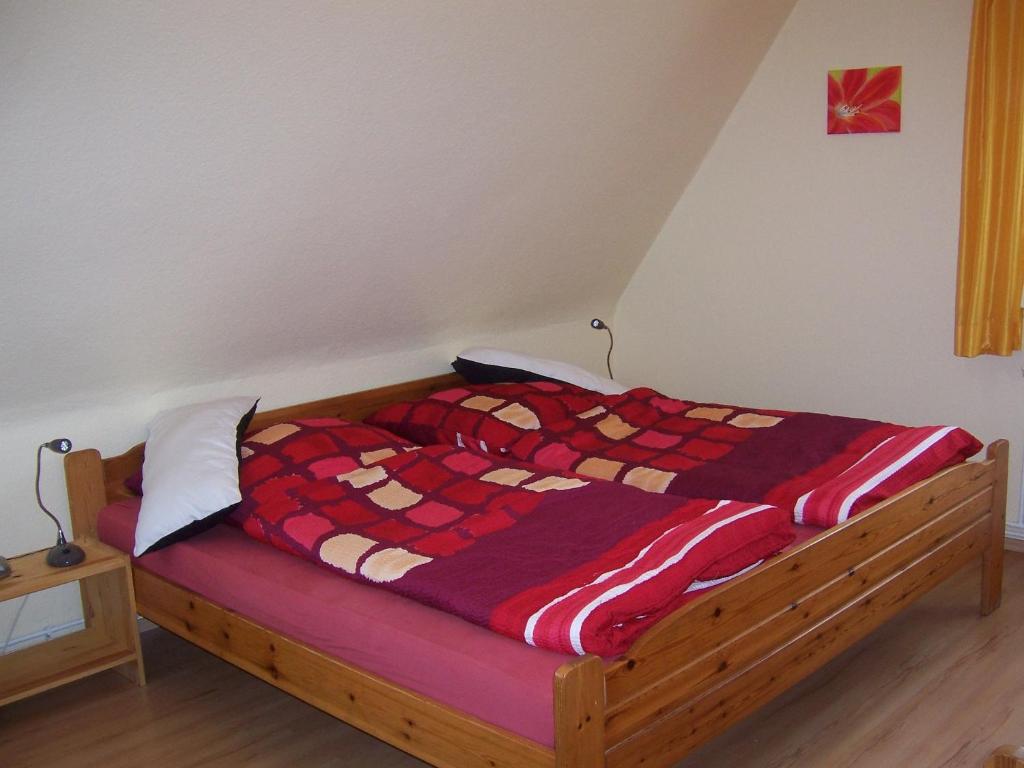 Postel nebo postele na pokoji v ubytování Haus am Roseneck