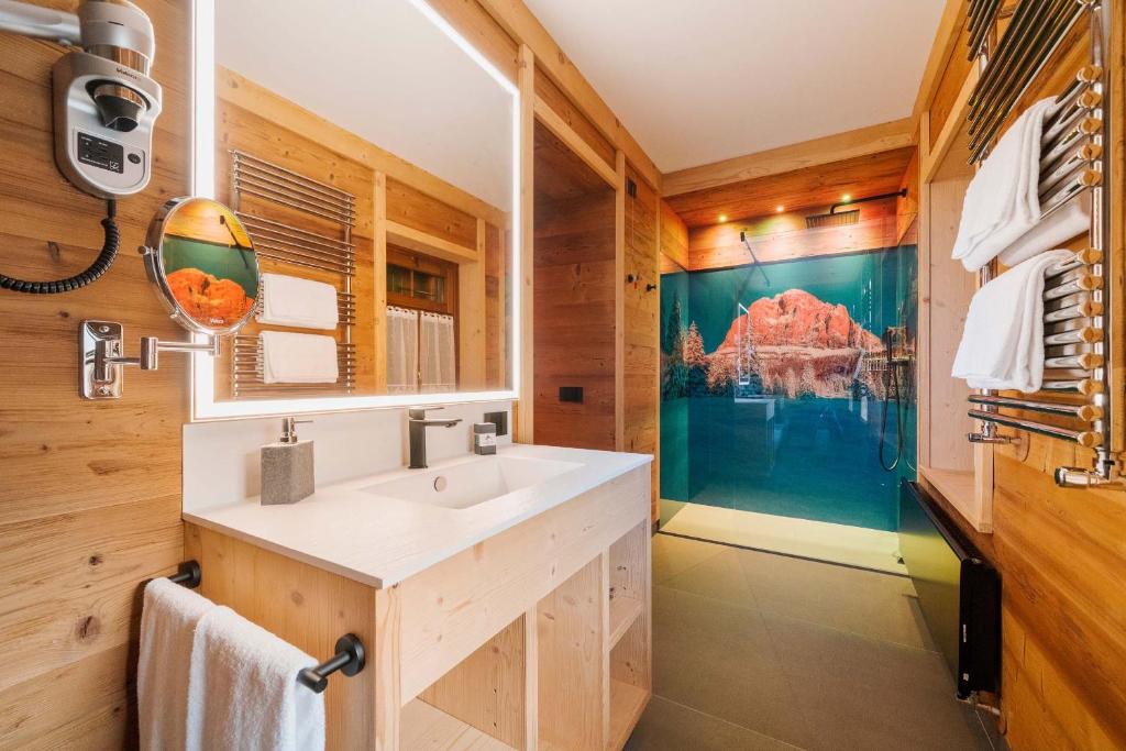 Ванная комната в Hotel Villa Alpina ***S