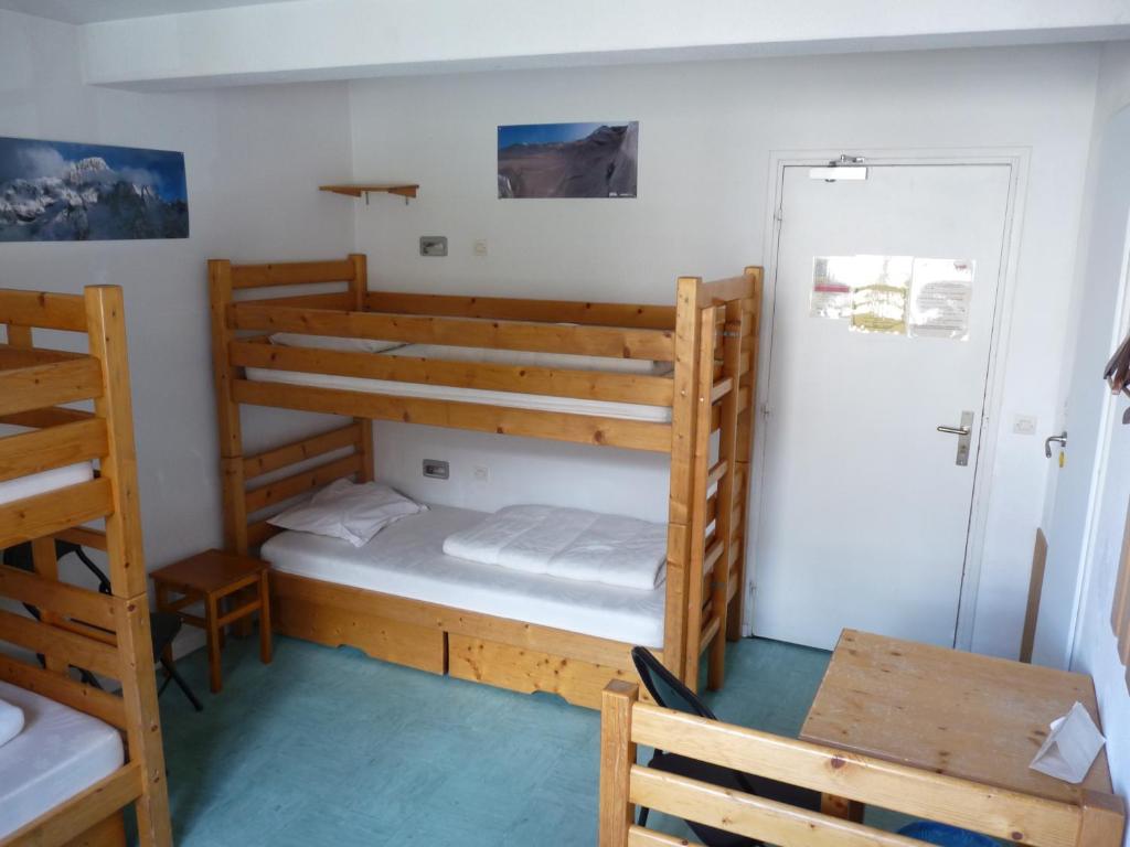 Postel nebo postele na pokoji v ubytování Gite l'Aiguillette du Lauzet