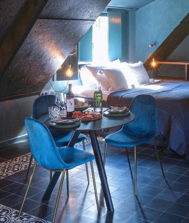 Postel nebo postele na pokoji v ubytování Hoeve La Cascina