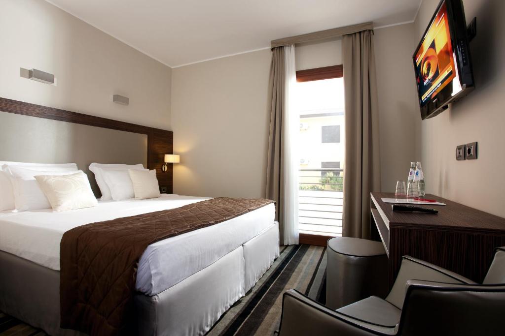 Posteľ alebo postele v izbe v ubytovaní BEST WESTERN Titian Inn Hotel Venice Airport