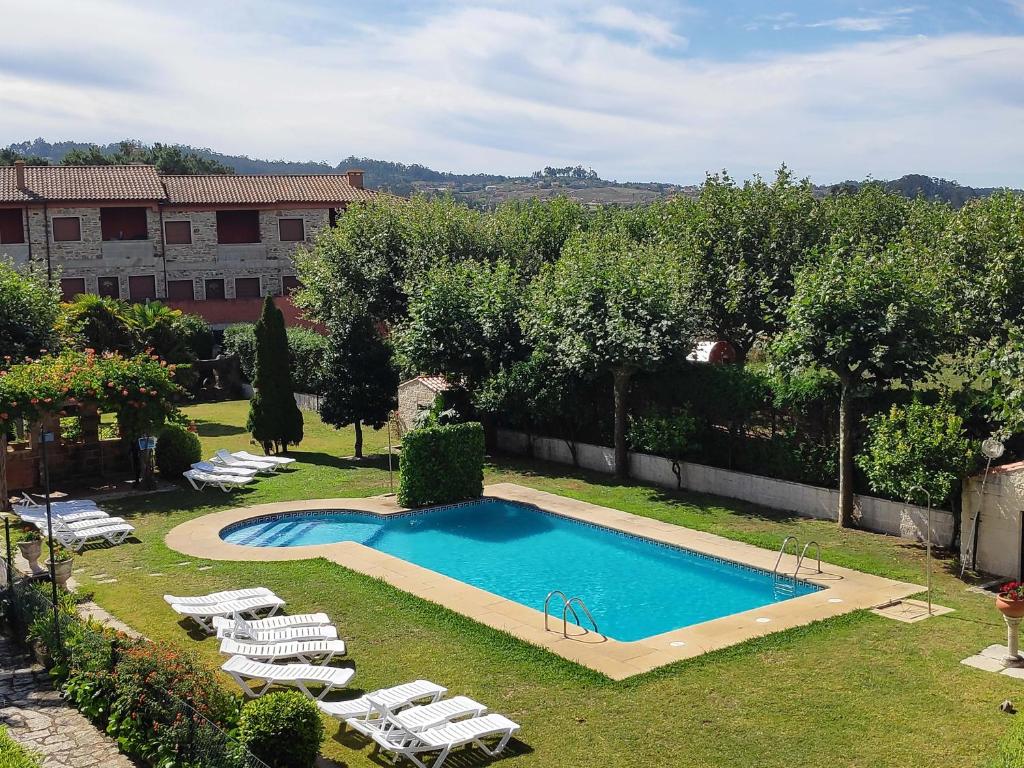 The swimming pool at or close to Apartamentos Revo Salinas 3000