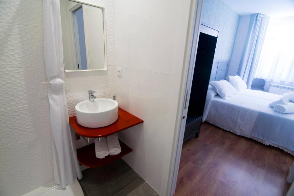 Posteľ alebo postele v izbe v ubytovaní Alojamientos MYL