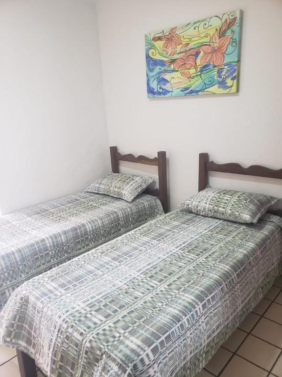 1 quarto 2 camas de solteiro, Guarapari – Preços 2024 atualizados