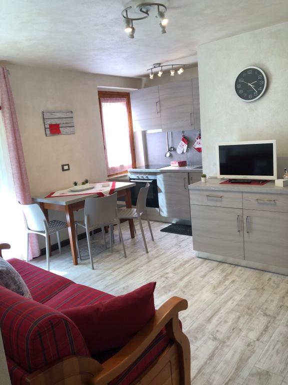 a living room with a kitchen and a dining room at Candide CIR PSD0031 in Pré-Saint-Didier