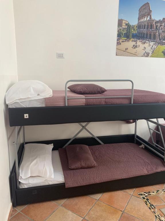 Postel nebo postele na pokoji v ubytování Zidan Guest House