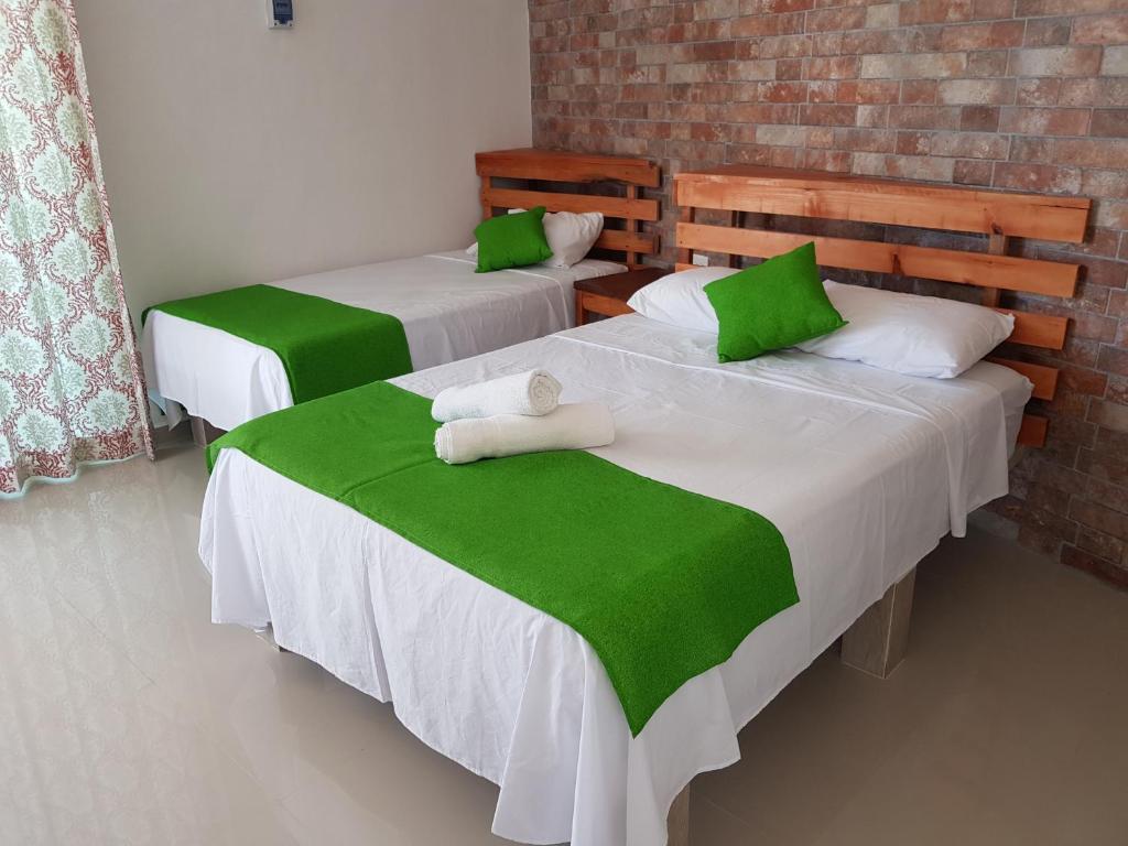 Postel nebo postele na pokoji v ubytování Villas del Carmen Holbox