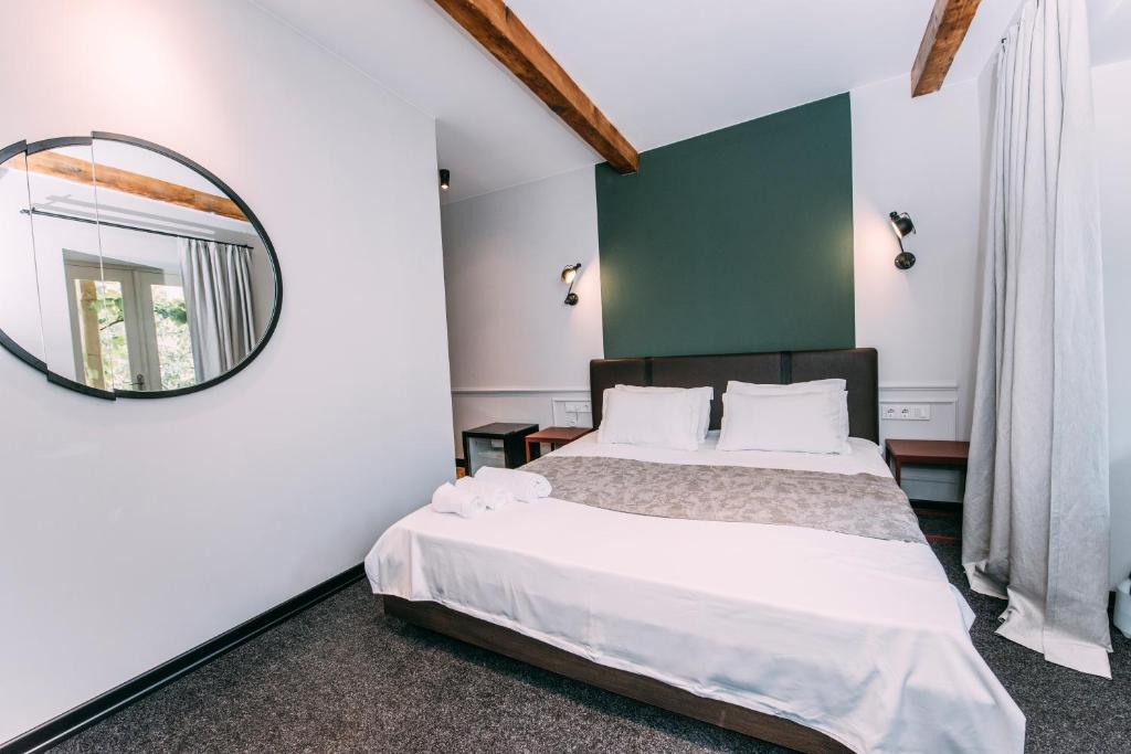 Postel nebo postele na pokoji v ubytování Atoneli Apartment hotel