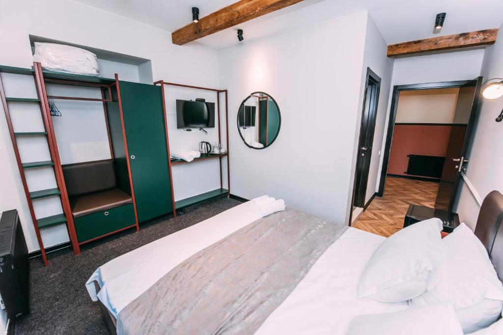 Postel nebo postele na pokoji v ubytování Atoneli Apartment hotel