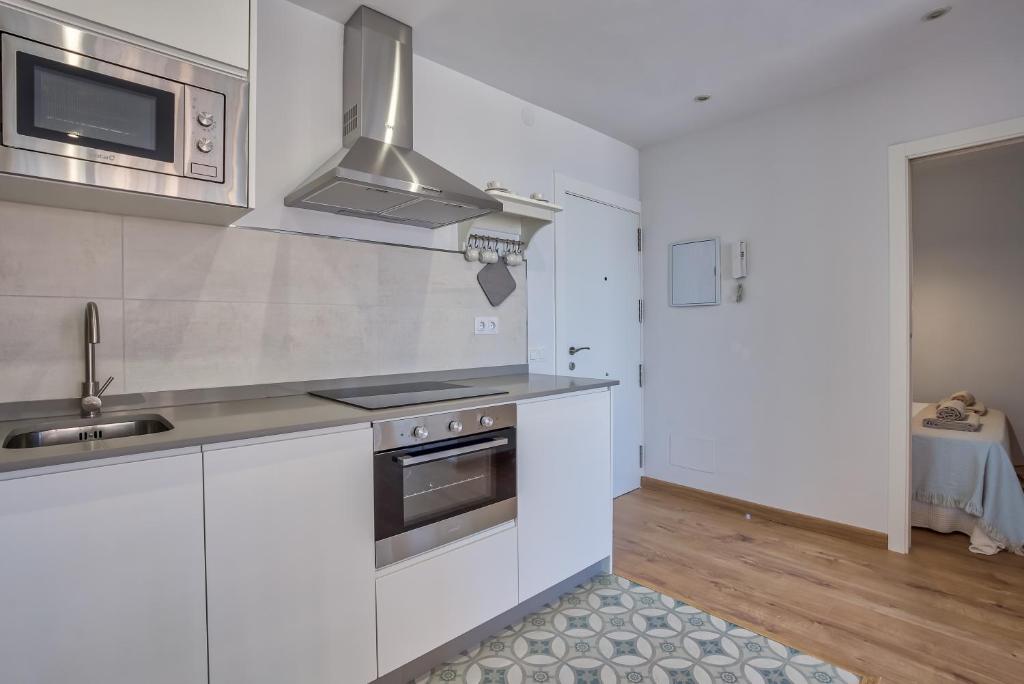 Kuchyň nebo kuchyňský kout v ubytování Sur Suites Perla 6-3