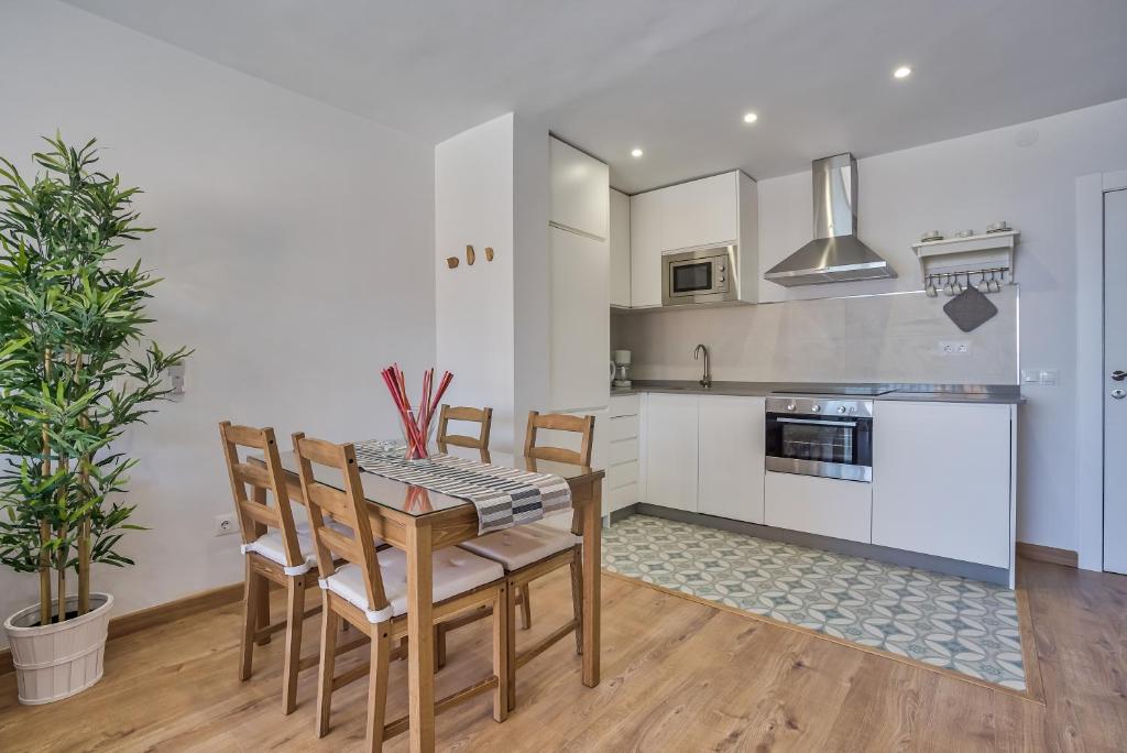 Kuchyň nebo kuchyňský kout v ubytování Sur Suites Perla 6-3