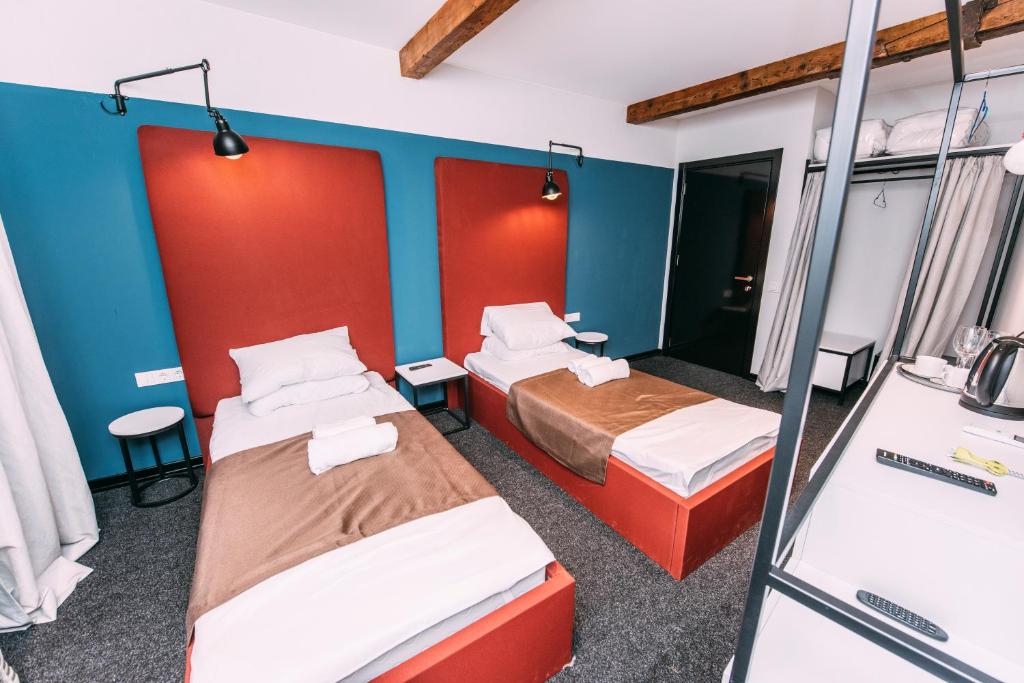 Postel nebo postele na pokoji v ubytování Atoneli Apartment hotel