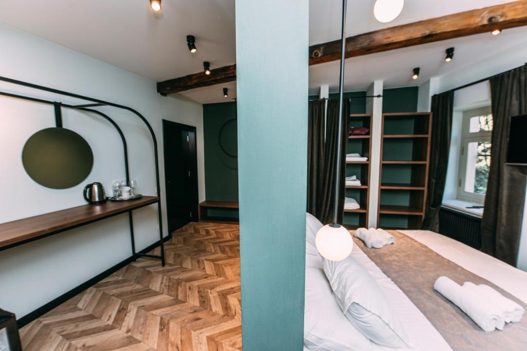 Postel nebo postele na pokoji v ubytování Atoneli Apartment hotel