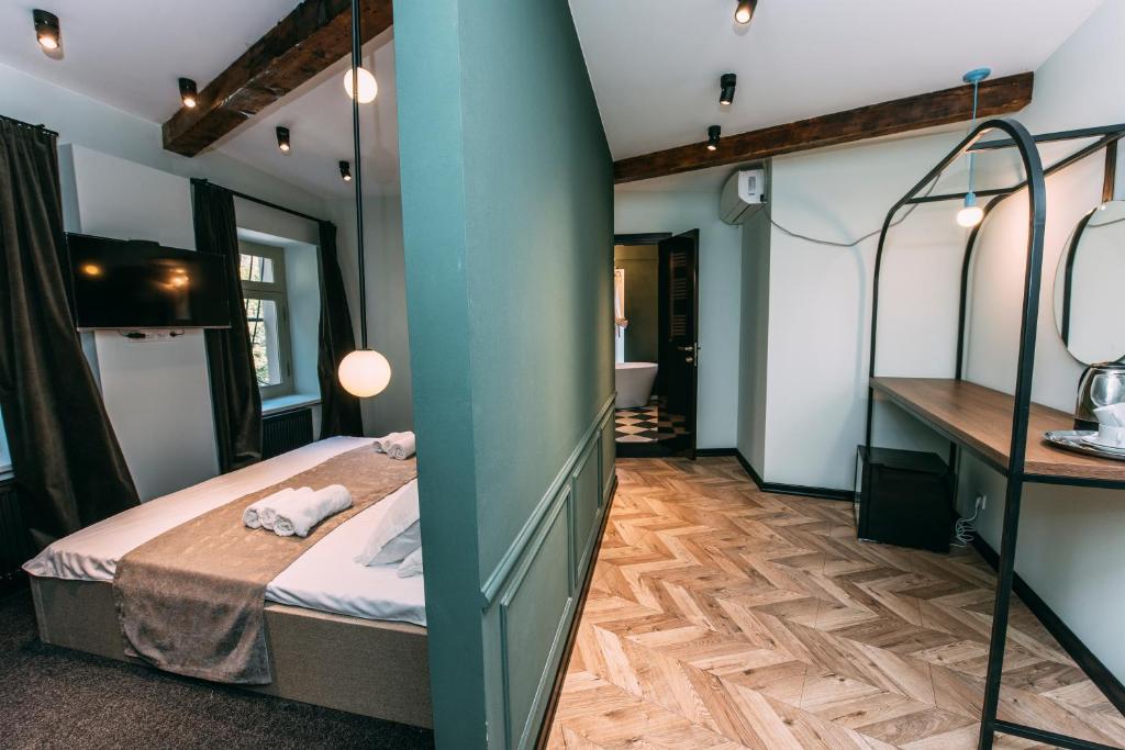 Postel nebo postele na pokoji v ubytování Atoneli Apartment hotel