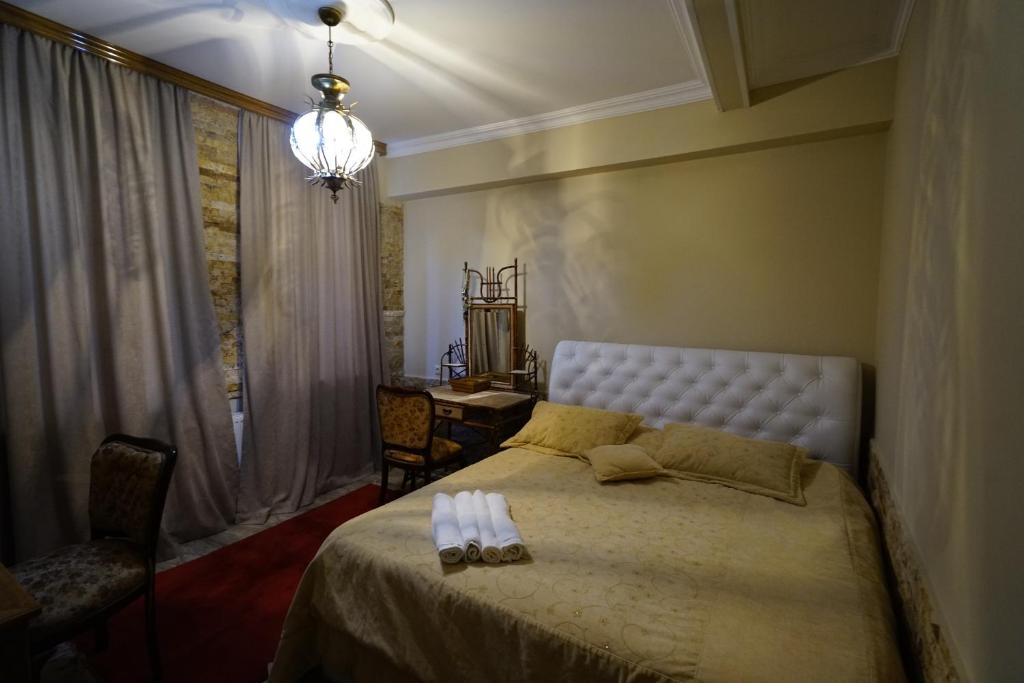 Postel nebo postele na pokoji v ubytování Hotel Daisy S Home
