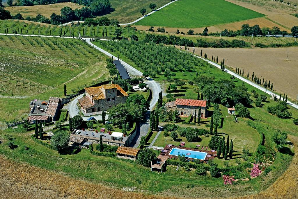 an aerial view of a house in a field at La Mandriola in Laiatico