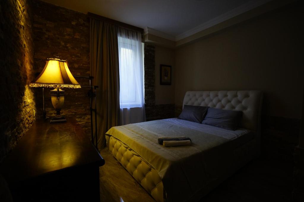 Postel nebo postele na pokoji v ubytování Hotel Daisy S Home