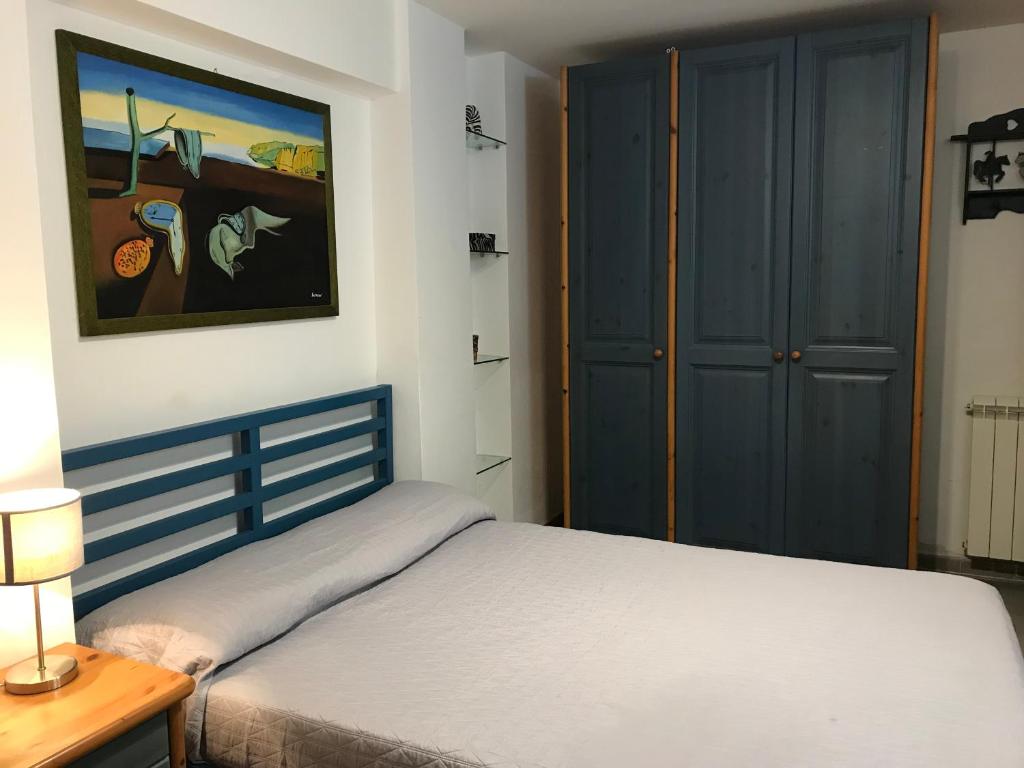 A bed or beds in a room at Villa Le Lanterne Pool & Relax