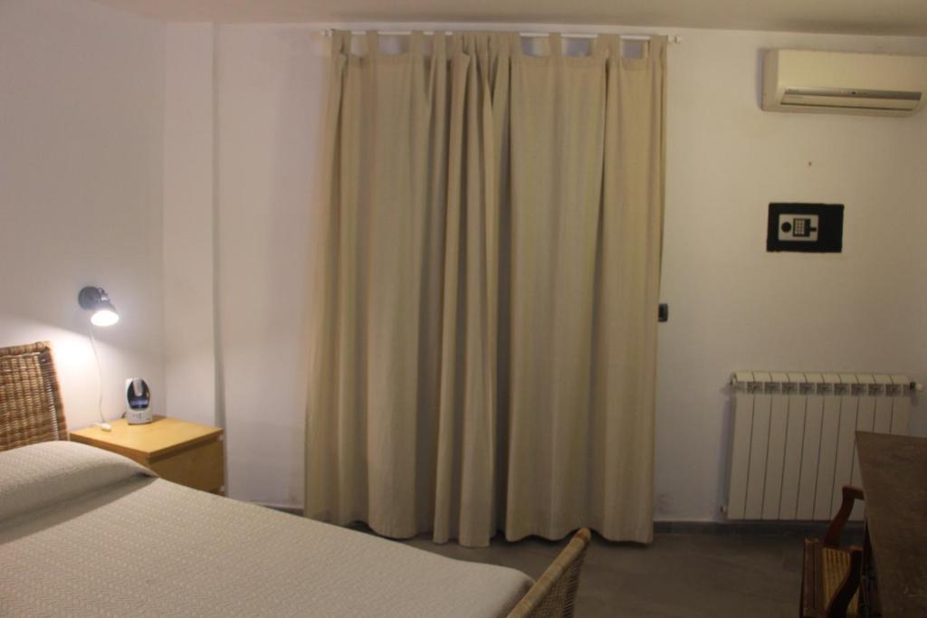 A bed or beds in a room at Villa Le Lanterne Pool & Relax