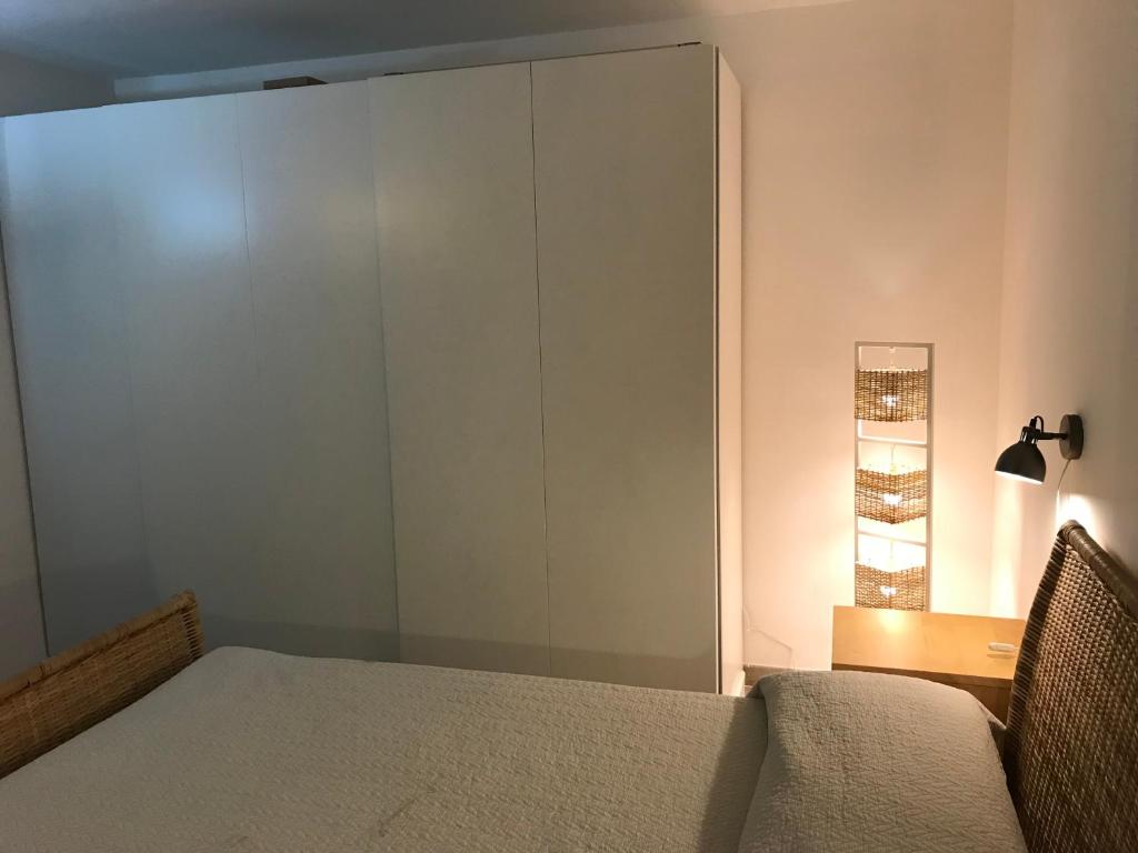 A bed or beds in a room at Villa Le Lanterne Pool & Relax