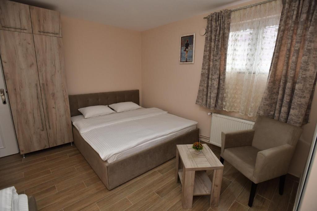 Postel nebo postele na pokoji v ubytování Alijansa