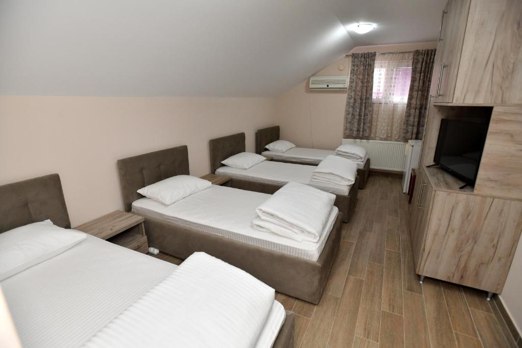 Postel nebo postele na pokoji v ubytování Alijansa