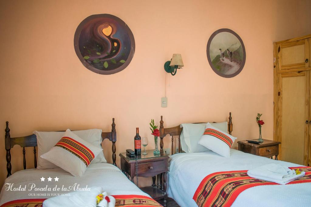 A bed or beds in a room at Hostal La Posada De La Abuela