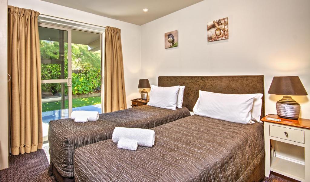 Voodi või voodid majutusasutuse Autoline Motel Queenstown toas