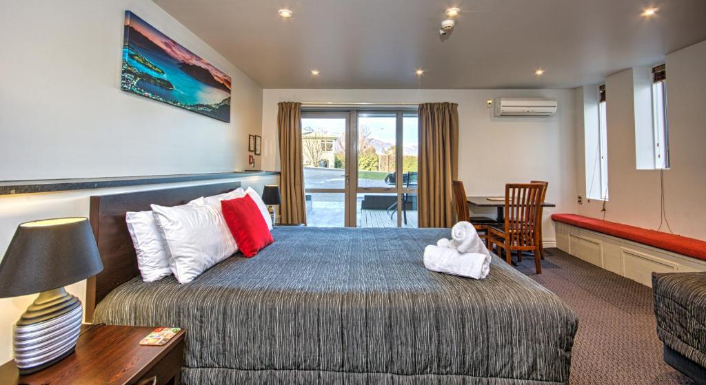 Voodi või voodid majutusasutuse Autoline Motel Queenstown toas