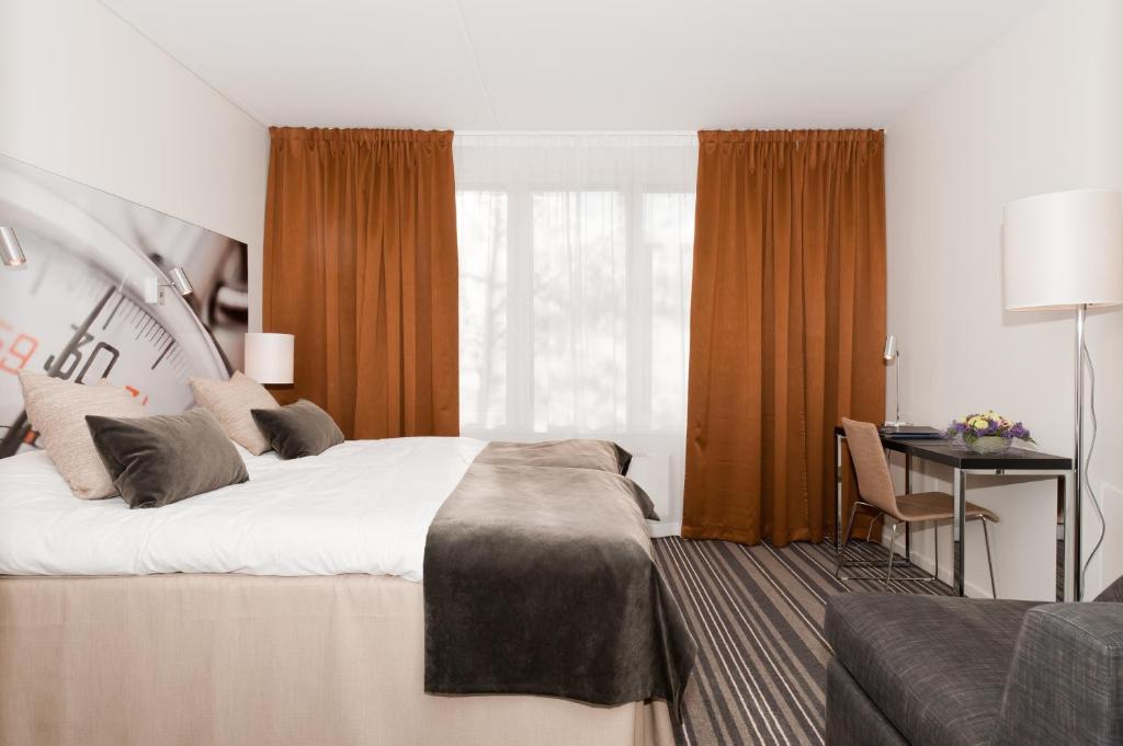 Postel nebo postele na pokoji v ubytování Bosön Hotell & Konferens
