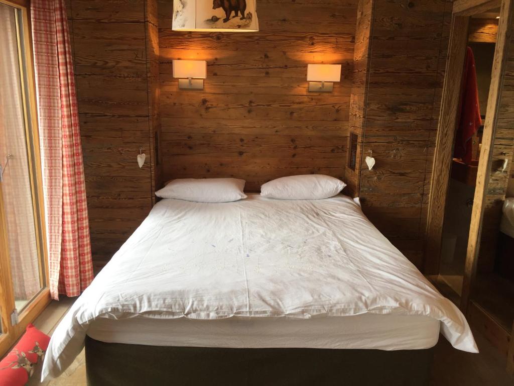 Postel nebo postele na pokoji v ubytování Verbier Valmont in center
