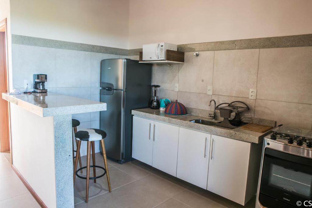  Apartamento Villa da Enseada - Praia privativa