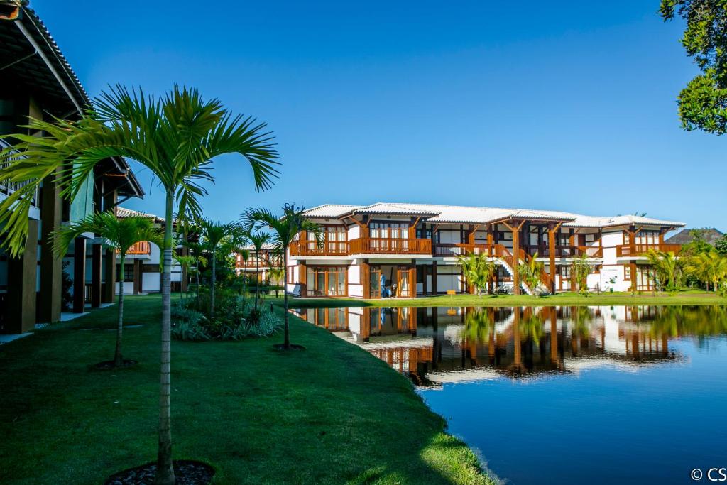  Apartamento Villa da Enseada - Praia privativa