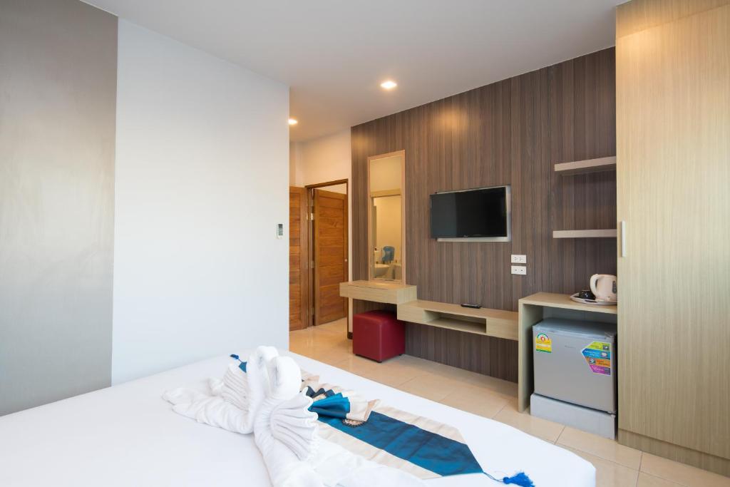 TV a/nebo společenská místnost v ubytování Baan Thai Beach Side Residence