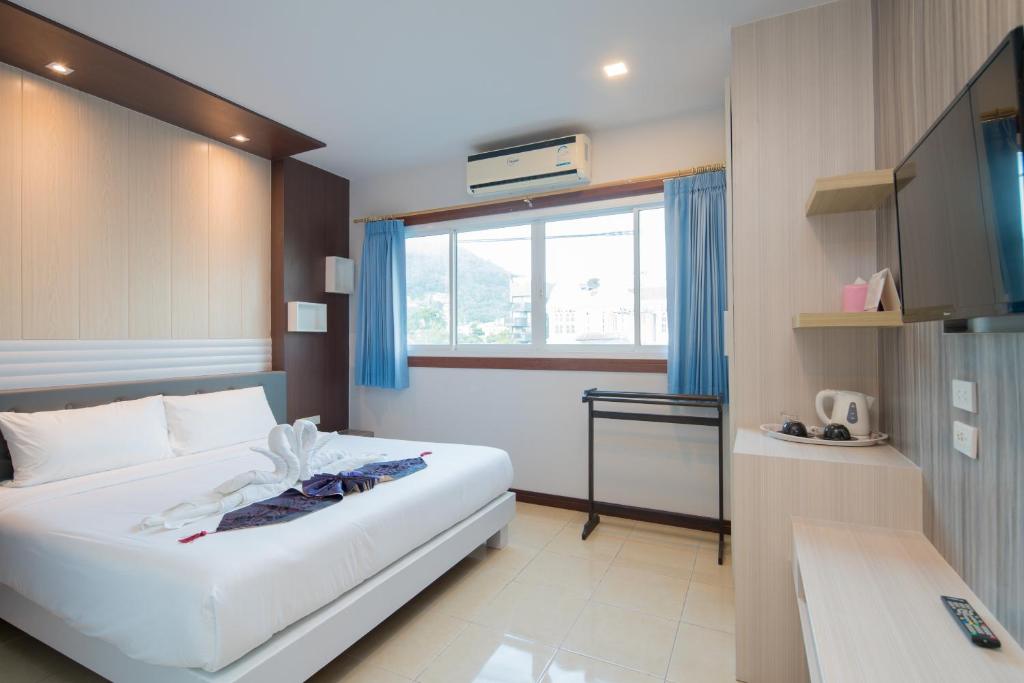 TV a/nebo společenská místnost v ubytování Baan Thai Beach Side Residence