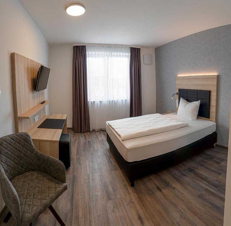 TV a/nebo společenská místnost v ubytování Hotel Schlafplatz